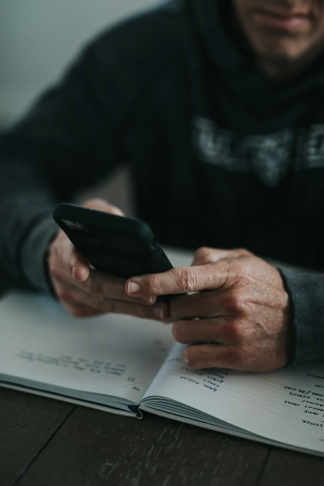 Small business owner reviewing their website on a smartphone
